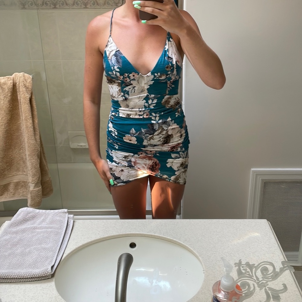 Floral mini dress with asymmetrical bottom